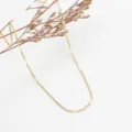 Close-up detail shot of a simple gold-colored stainless steel plain chain necklace for daily wear. - 45cm / 14K Gold Stainless Steel