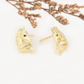 Close-up detail of stylish gold horse head stud earrings showcasing exquisite craftsmanship. - 14K Gold Plated