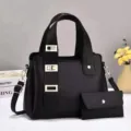 Borsa a mano nera da donna con comoda pochette abbinata e dettaglio cinturino elegante. - L28 P13 A20 / Nero