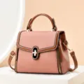 Borsa a mano rosa e marrone in ecopelle, elegante borsa a tracolla con manico superiore e cinghia. - Rosa e Giallo Terra