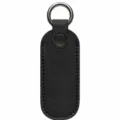 Funda protectora de cuero negro para memoria USB con llavero de anillo metálico - Negro