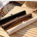 Rolled leather picnic mat and outdoor desk pad detail showing black, brown and beige colors. - 43*30cm / Apricot