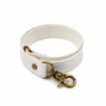 White leather curtain tie-back with bronze metal buckle, minimalist home decor strap. - White