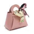 Scatola regalo in pelle rosa sacchetto di caramelle confezione bomboniere con nastro carino. - Rosa