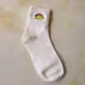 Comfortable white cotton mid-calf socks for women featuring cute embroidered dinosaur patterns. - One Size / White (Pink Yellow)