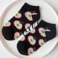 apple print black ankle socks detail shot, cute cotton casual footwear close up - Apple / Black Apple