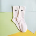 White crew socks with letter embroidery, comfortable casual cotton socks for daily wear. - One Size / SLUT / White