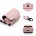Pink PU leather wireless earphone protective case with keychain strap and precision cutouts. - Pink