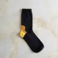 Black crew socks featuring a funny yellow duck head design, soft cotton casual daily wear. - One Size / Black