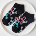 Black ankle socks with cute cartoon bird patterns, breathable cotton material for daily casual wear. - Black Bird