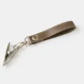 Baby stroller shoe clip detail shot featuring brown leather strap and stainless steel metal hook. - Cocoa Brown