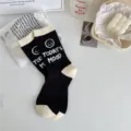 Black and white mid-calf socks for women, trendy cotton casual smiley letter print socks. - Black