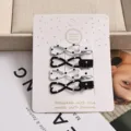 Paquete de 4 pinzas de pelo mate coreanas de 3 cm, pinzas pico de pato con lazo para niñas. - Conjunto de 4 Piezas Lazo / 4 Piezas/Pack