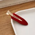 Pinza para el pelo roja de acetato en forma de gota con diseño dorado, accesorio elegante. - Rojo