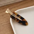 Pinza de pelo de gota de acetato geométrica pico de pato metal dorado diario - Ámbar