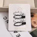Lot de 4 pinces à cheveux ovales à pois noirs et blancs pour filles, accessoires de coiffure mignons. - Ensemble de 4 Pièces Ajouré / 4 Pièces/Paquet