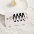 Black hair clips set, cute duckbill hairpins for women and girls, sweet fringe styling. - Hollow-out 4-Piece Set / Black