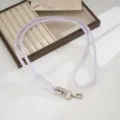 Lavender TPU telephone cord phone lanyard detail, durable crossbody strap with metal hooks. - Purple