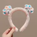 Schattige pluche kattenpoot haarband in roze, zacht harig ontwerp voor dagelijks leuke stijl. - Roze
