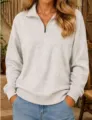 Detailed view of women's half-zip long sleeve sweatshirt in light gray casual style. - S / Tops / Light Gray