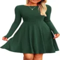 Detailed view of the dark green ribbed knit long sleeve flare mini dress showing texture. - S / Dresses / Green