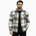 Close-up view of the casual men's plaid long-sleeve shirt showcasing buttons and pattern. - S / Tops / Grey Patchwork Plaid