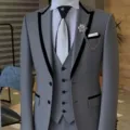 Elegant grey men's three-piece suit featuring black lapel, matching vest, and stylish brooch. - S / Top And Bottom (QXFWT-AL3-3) / Gray Contrast Lapel