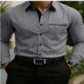 Men's long sleeve striped shirt detail showing black white pattern, collar and pocket design. - S / Tops / Black & White Stripes