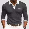 Close-up of men's long sleeve polo shirt featuring contrast white collar and cuff stripes detail. - Dark Gray Contrast