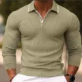 Detail view of men's long sleeve polo shirt, contrast collar piping and fine knit texture. - Navy Blue Contrast
