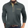 Close-up detail of the men's long sleeve polo shirt featuring contrast color collar and pocket. - Blue Splicing