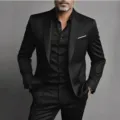 Close-up detail of the premium black suit jacket and trousers set, elegant tailoring. - S / Top And Bottom / Black