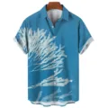 Detailed view of blue short-sleeve shirt with white tropical plant print and button design. - S / Tops / CSM-0349