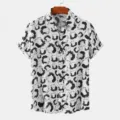 Men's short sleeve button down shirt with black and white abstract print casual stylish top. - S / Tops / Black and White Abstract Print