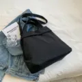 Black canvas tote bag, large capacity stylish casual shoulder and crossbody bag for daily wear - Black