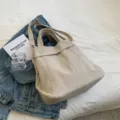 Casual beige canvas shoulder bag for women, large capacity daily crossbody bag, stylish design. - Light Beige