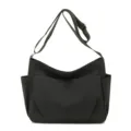 Black nylon crossbody bag, large capacity slouchy shoulder bag with multiple pockets. - Black