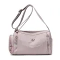 Casual nylon crossbody bag in dusty pink, multi-pocket design with adjustable shoulder strap. - Light Pink