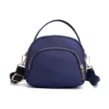 Dark blue women handbag canvas crossbody bag with gold zippers and top handle for daily use - Blue
