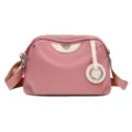 Pink nylon shoulder bag with stylish beige patch accent and large capacity for daily use. - Pink