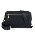 Black nylon crossbody bag with gold hardware and wide strap for women daily casual travel. - Black