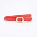 Red women's thin leather belt featuring an elegant pearl and crystal oval buckle design. - 100cm / Cross Grain Red