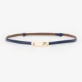 Elegant women's thin leather belt with gold metal buckle, perfect for dresses and coats. - Patent Royal Blue