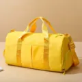 Large capacity yellow duffel bag, versatile travel gym bag with shoulder strap for sports. - Yellow