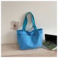 Sac cabas fourre-tout bleu à carreaux pour femme, grand sac d'épaule quotidien avec poche zippée. - Bleu ciel