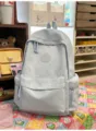 Light blue quilted backpack casual cute Japanese style travel daypack with front pocket - No Pendant / Blue