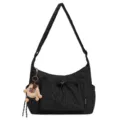 Black grid nylon shoulder bag with drawstring front pocket and cute furry plush keychain. - With Pendant / Black