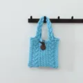 Sac à main en tricot torsadé bleu clair, sac cabas décontracté en laine pour l'automne et l'hiver. - Style Torsades Bouton / Bleu lac