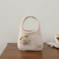 Beige knitted handbag with cute cartoon pig doll charm, stylish mini tote bag for women. - Beige