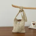 Sac bandoulière rétro en tricot torsadé avec bouton en bois, petit sac décontracté. - Abricot